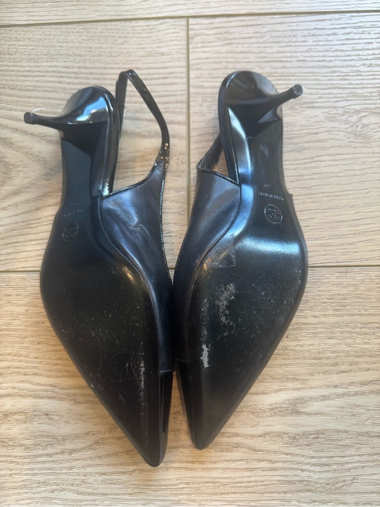 CHANEL Shoes - CHANEL Black Leather Pointed Toe Slingback Heels